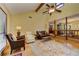 Open living room with high ceiling, wood accents, and clear views to the dining room and kitchen at 4920 Tremont Ne Dr, Marietta, GA 30066