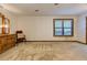 A primary bedroom featuring carpet, a window, and a vintage dresser at 4920 Tremont Ne Dr, Marietta, GA 30066