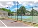 A community tennis court with well-maintained surface and fencing at 4920 Tremont Ne Dr, Marietta, GA 30066
