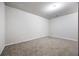 This bedroom offers neutral carpet and paint, with bright overhead lighting at 1005 Bayrose Cir # 5A, Atlanta, GA 30344