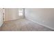 Cozy bedroom with neutral carpeting and natural light from a window at 1005 Bayrose Cir # 5A, Atlanta, GA 30344