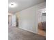 Main bedroom features neutral carpet and entryways to bathroom and closet at 1005 Bayrose Cir # 5A, Atlanta, GA 30344