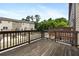 View from wood deck overlooks neighboring units and trees at 1005 Bayrose Cir # 5A, Atlanta, GA 30344