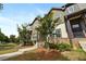 Street view of attractive townhomes with brick and siding, showcasing a professionally landscaped curb appeal at 1005 Bayrose Cir # 5A, Atlanta, GA 30344