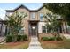 Attractive townhome with brick and siding, complemented by professionally landscaped front yard at 1005 Bayrose Cir # 5A, Atlanta, GA 30344