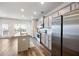 Stylish kitchen with stainless appliances, granite counters, island and an open layout perfect for entertaining at 1005 Bayrose Cir # 5A, Atlanta, GA 30344