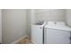Convenient laundry room with modern white washer and dryer set at 1005 Bayrose Cir # 5A, Atlanta, GA 30344