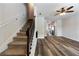 Open concept living area flows into kitchen, complemented by hardwood floors and staircase at 1005 Bayrose Cir # 5A, Atlanta, GA 30344
