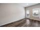 Bright living room featuring wood-look flooring, natural light, and access to the outdoor area at 1005 Bayrose Cir # 5A, Atlanta, GA 30344