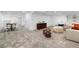 The finished basement features versatile living spaces, including a lounge area and a game table at 1658 E Clifton Ne Rd, Atlanta, GA 30307