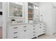Bright bathroom featuring double sink vanity with marble countertops, storage and a modern design at 1658 E Clifton Ne Rd, Atlanta, GA 30307