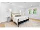 Bright primary bedroom with hardwood floors, light walls, and large windows at 1658 E Clifton Ne Rd, Atlanta, GA 30307