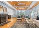 Inviting living space with hardwood floors, fireplace, and open layout connecting kitchen and dining areas, ideal for gatherings at 1658 E Clifton Ne Rd, Atlanta, GA 30307