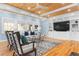 Cozy living room with wood floors, built-in shelving, and large windows for natural light, perfect for relaxation at 1658 E Clifton Ne Rd, Atlanta, GA 30307