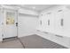 This mudroom features white cabinets, bench seating, and convenient coat and shoe storage near the entrance at 1658 E Clifton Ne Rd, Atlanta, GA 30307