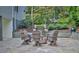Outdoor patio offers a cozy seating area with chairs surrounding a fire pit for relaxation and entertaining at 1658 E Clifton Ne Rd, Atlanta, GA 30307