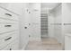 Walk-in closet offering custom shelving, hanging rods, and plenty of storage space at 1658 E Clifton Ne Rd, Atlanta, GA 30307