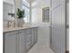 Charming bathroom with gray cabinets, double sinks, and elegant decor at 190 Rolison Way, Fayetteville, GA 30214