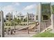 Outdoor playground area for children with climbing structure, slide, and attractive neighborhood homes at 190 Rolison Way, Fayetteville, GA 30214