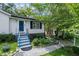 This home has an inviting entrance, a landscaped yard, and a beautiful exterior at 881 Mclinden Se Ave, Smyrna, GA 30080