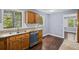 Spacious kitchen offers hardwood floors and stainless steel appliances at 881 Mclinden Se Ave, Smyrna, GA 30080