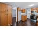 Charming kitchen featuring stainless steel appliances and wood cabinets at 881 Mclinden Se Ave, Smyrna, GA 30080