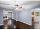 Inviting living room with hardwood floors, fireplace, and ceiling fan at 881 Mclinden Se Ave, Smyrna, GA 30080