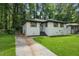An alternate view of a renovated home on a beautiful lot at 3176 Pollard St, Atlanta, GA 30344