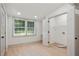 An interior laundry area provides space for cleaning supplies and an open doorway at 3176 Pollard St, Atlanta, GA 30344