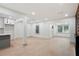 Spacious living area featuring wood floors, pot lights, and an open floor plan at 3176 Pollard St, Atlanta, GA 30344