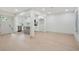An open concept living area is connected to a kitchen featuring stainless steel appliances at 3176 Pollard St, Atlanta, GA 30344