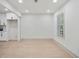 Clean and bright area offers neutral walls, recessed lighting, and hardwood flooring at 3176 Pollard St, Atlanta, GA 30344