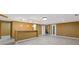 A finished basement area with a bar and access to a workout room at 4474 Michael Jay St, Snellville, GA 30039