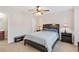 Bedroom with a ceiling fan and ensuite bathroom at 4474 Michael Jay St, Snellville, GA 30039