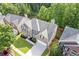 A beautiful brick two-story home with an attached two car garage, and mature trees, offering the perfect curb appeal at 4474 Michael Jay St, Snellville, GA 30039