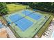 Aerial view of well-maintained tennis courts perfect for an active lifestyle in a Gathering-friendly community at 4474 Michael Jay St, Snellville, GA 30039