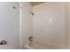 Bathroom with white tile, bathtub, and shower- perfect for a clean and functional space at 1079 Stonewall Drive Southeast, Atlanta, GA 30315