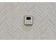 Close-up of marble herringbone tile in the shower at 121 Fairway Overlook, Woodstock, GA 30188