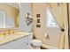 Stylish bathroom features granite countertop vanity, decorative lighting, and elegant fixtures for a luxurious touch at 121 Fairway Overlook, Woodstock, GA 30188
