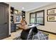 Home office with custom built-ins and modern desk at 121 Fairway Overlook, Woodstock, GA 30188