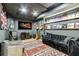 Basement recreation room with ample space for music and entertainment at 121 Fairway Overlook, Woodstock, GA 30188