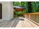 A wooden porch with outdoor furniture at 210 Hunters Vw, Roswell, GA 30075