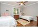 Charming bedroom featuring hardwood floors, two twin beds, and a window for natural light at 210 Hunters Vw, Roswell, GA 30075