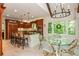 Charming eat-in kitchen featuring granite island and stainless appliances at 210 Hunters Vw, Roswell, GA 30075