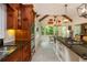 Gourmet kitchen featuring custom wood cabinetry and granite countertops at 210 Hunters Vw, Roswell, GA 30075