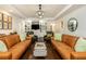 Spacious living room with hardwood floors, coffered ceilings, and stylish decor at 210 Hunters Vw, Roswell, GA 30075