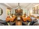 Inviting living room features a stone fireplace, hardwood floors, and stylish decor at 210 Hunters Vw, Roswell, GA 30075