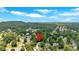Stunning aerial view of neighborhood homes with lush greenery and mature trees at 3158 Crestmont Nw Way, Kennesaw, GA 30152