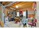 Basement featuring multiple monitors, desk, and seating area with exposed ceiling at 3158 Crestmont Nw Way, Kennesaw, GA 30152