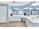 Bathroom with blue walls, double vanity, separate shower and commode rooms at 3158 Crestmont Nw Way, Kennesaw, GA 30152